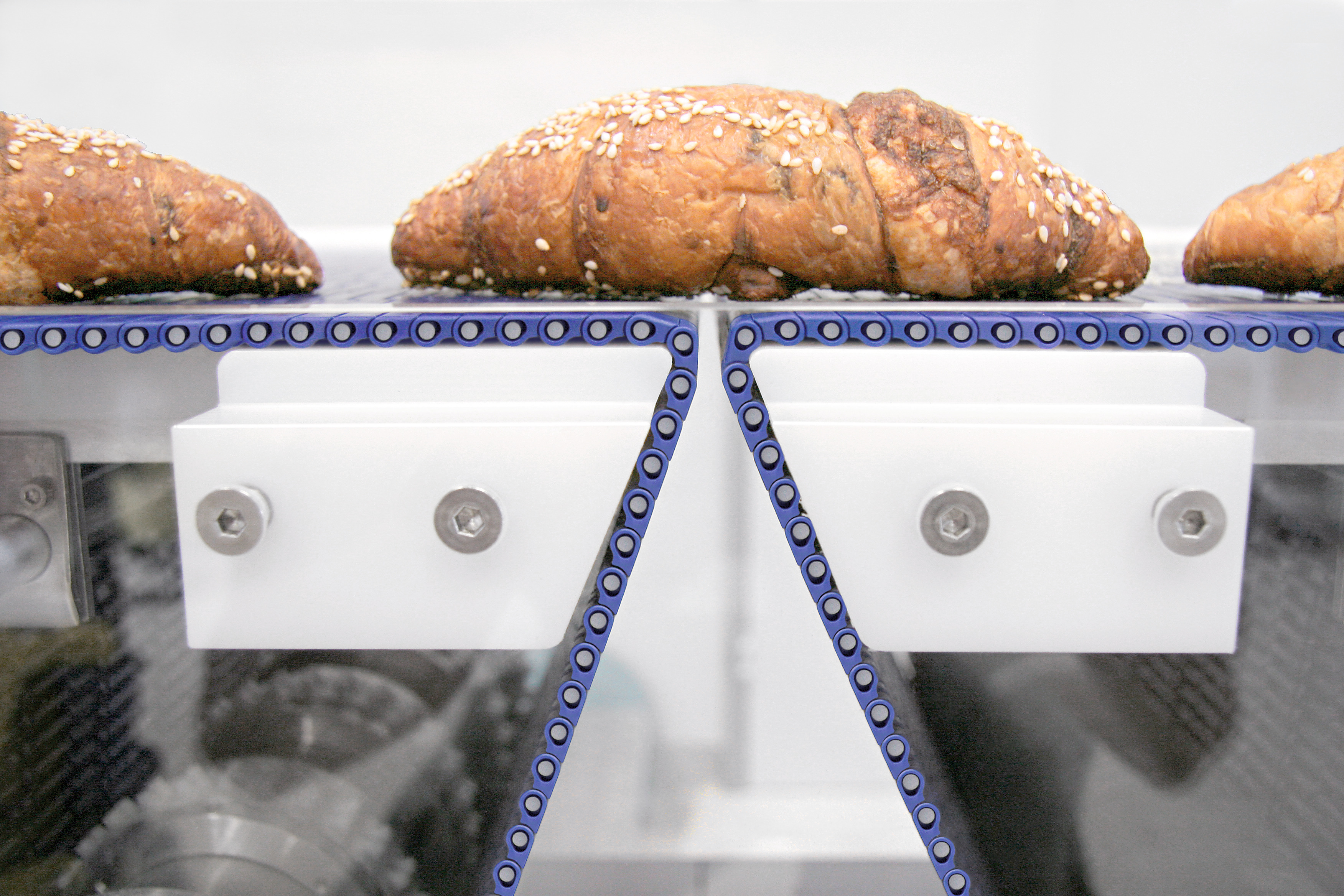 micropitch04.jpg pastry buns moving on conveyor belt